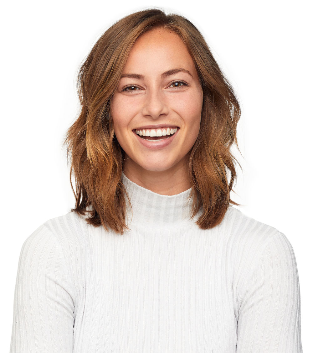 portrait of young happy woman looks in camera